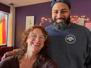 two people smiling