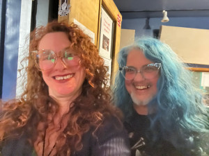 two people smiling