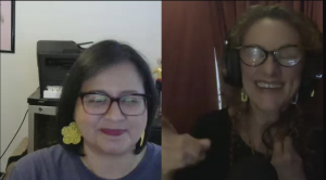 two women smiling in a split screen online meeting
