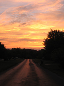 Sunset over a country road 