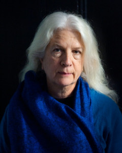 Martha Hennessy A photo of Martha Hennessy in a blue scarf