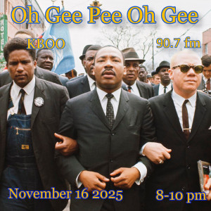 MLK marches toward the viewer with his arms linked with a wall of brave people