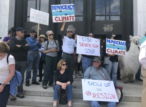 Climate activists protest OR republican legislators fleeing the state