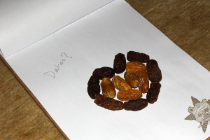 An image of dates arranged into a heart in a card with the Self Help Radio logo on it