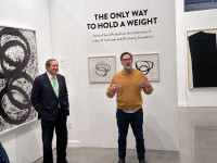 Collector Jordan Schnitzer (L) and curator Danuel Duford discussing Richard Serra's prints