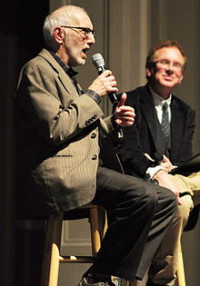 Nick Licata with journalist John Nichols in the background Nick Licata with journalist John Nichols in the background