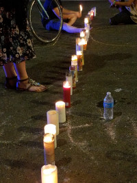 a barricade of lights to answer ICE's street blockage at their dungeon